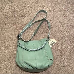 New with tags. The Sak.